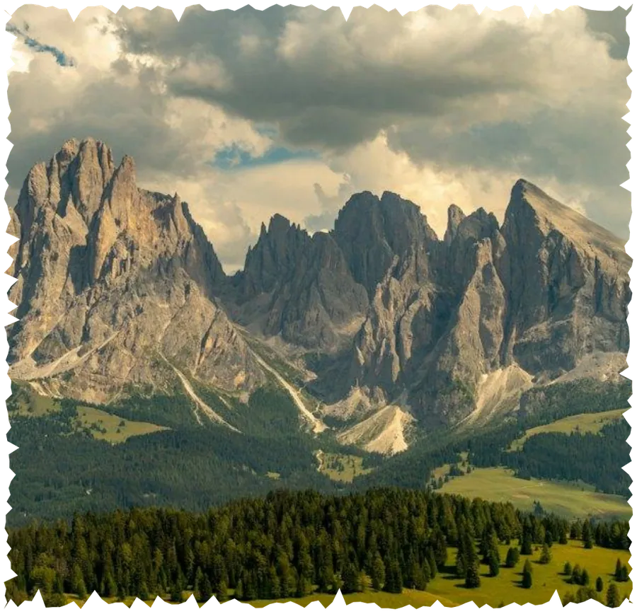Dolomites sports camp: peaks above an alpine meadow